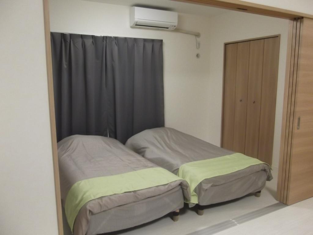 Ferienwohnung Rainbow Terrace Ginowan Exterior foto