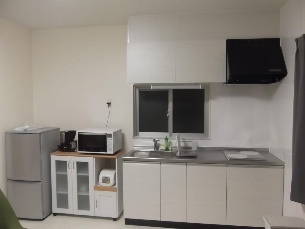 Ferienwohnung Rainbow Terrace Ginowan Exterior foto