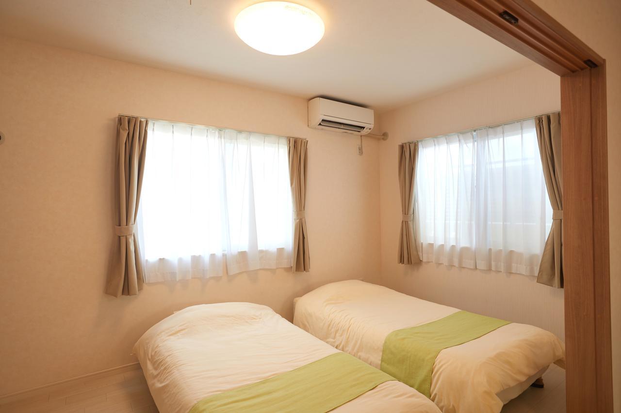 Ferienwohnung Rainbow Terrace Ginowan Exterior foto